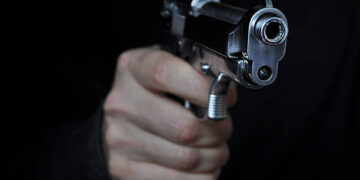 Shooting a gun in night